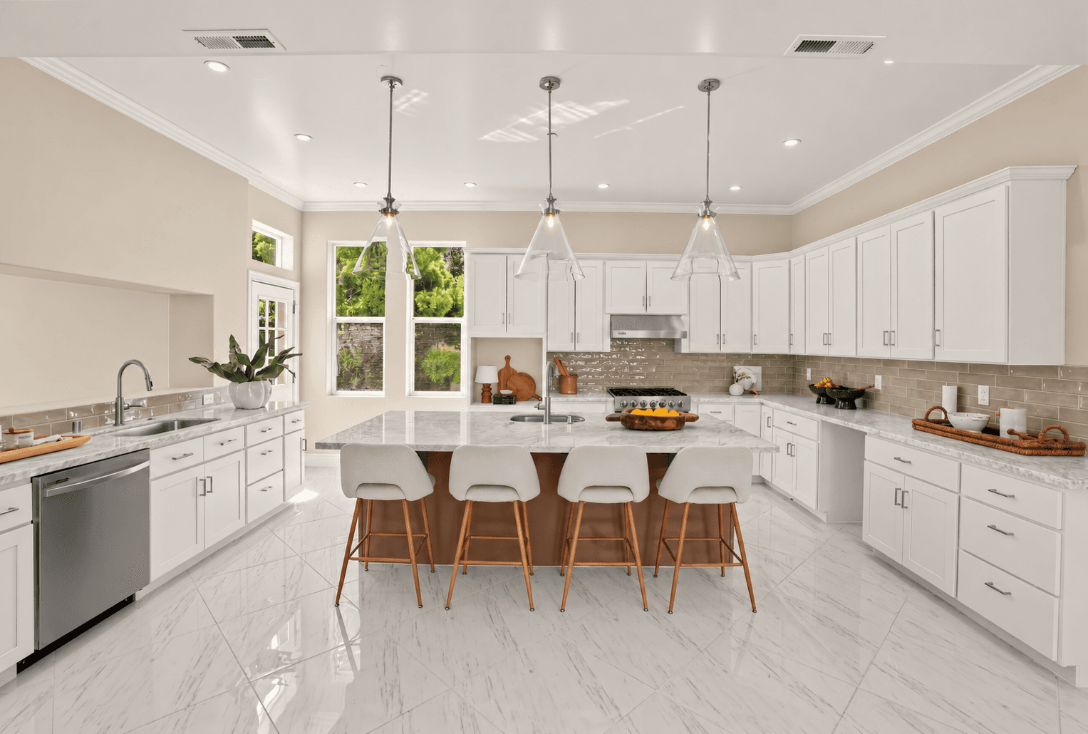 Renovated Berkeley kitchen with soft white perimeter cabinets and a warm-toned island