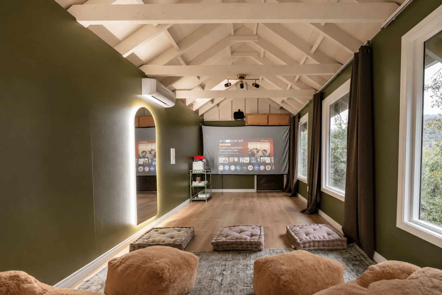 Finished forest-green theater and yoga room in Oakhurst